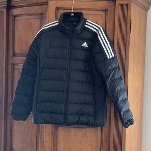 Adidas black puffer coat with high neck and zip to the top.